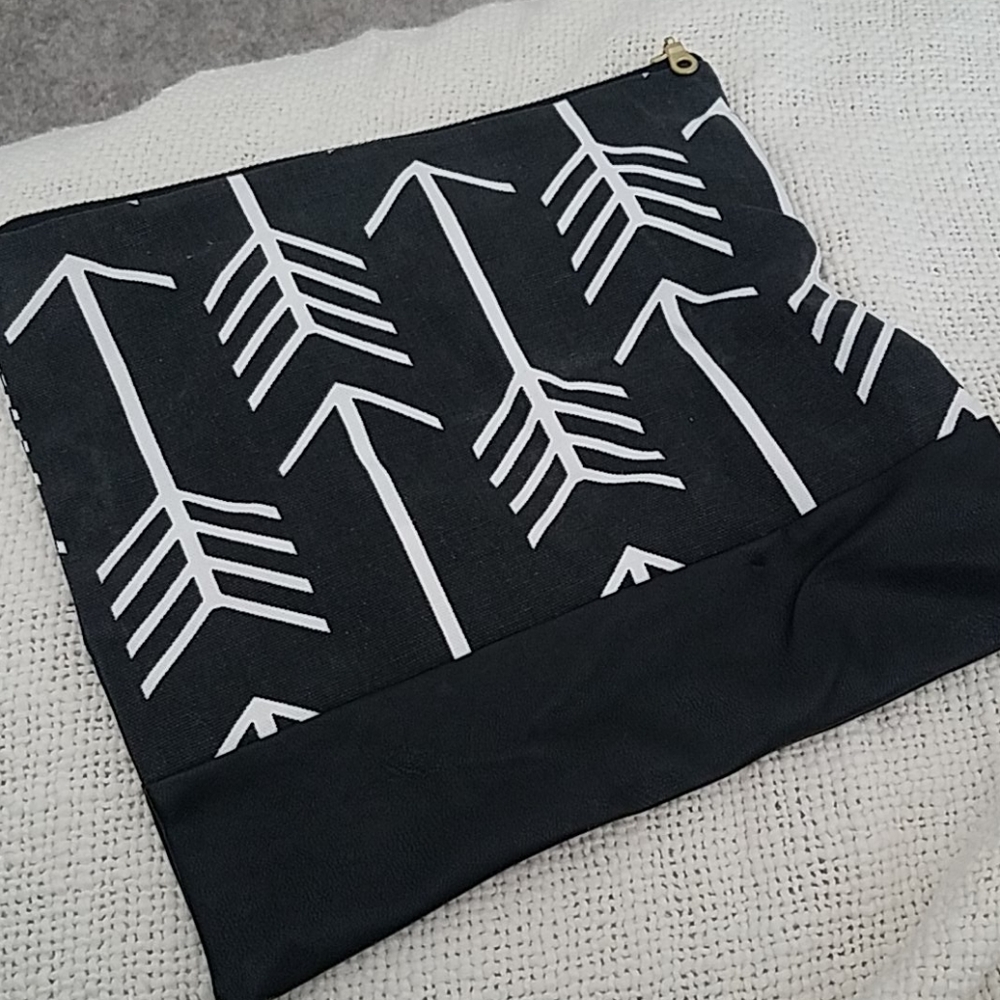 Canvas and faux leather fold clutch